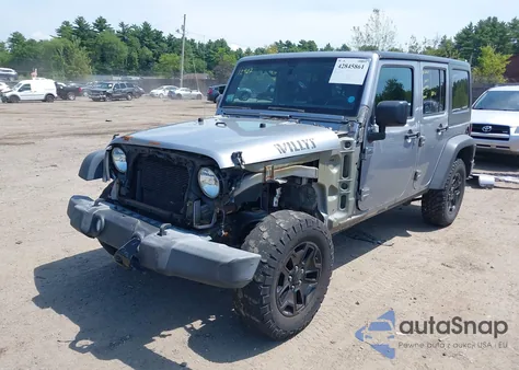 2016 Jeep Wrangler Unlimited Willys Wheeler z USA, uszkodzony, nr VIN 1C4BJWDG2GL283588